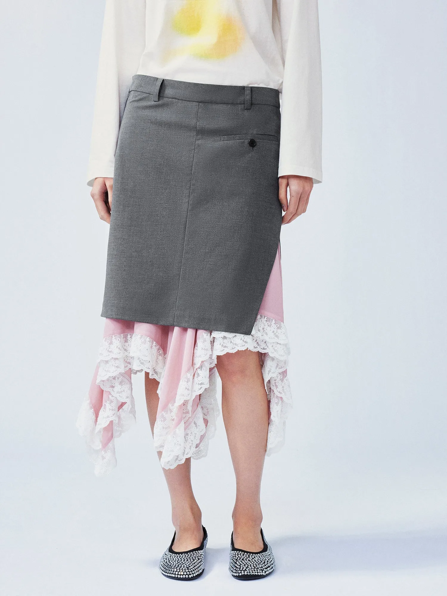 A misaligned suit layered-look skirt