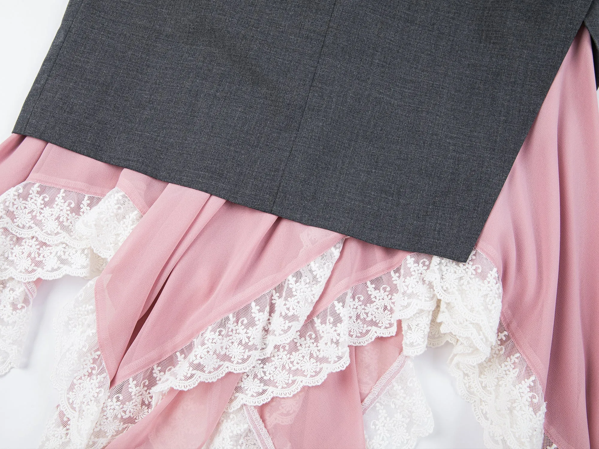 A misaligned suit layered-look skirt