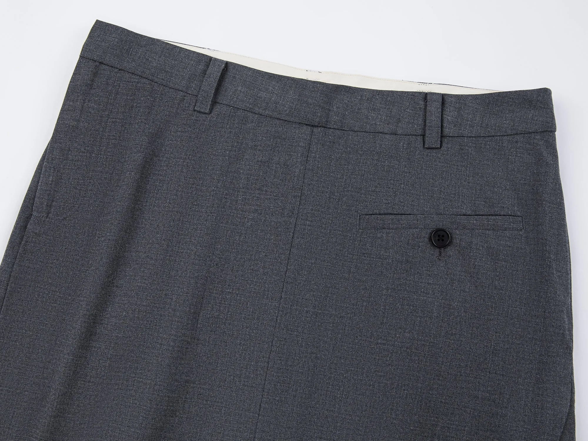 A misaligned suit layered-look skirt